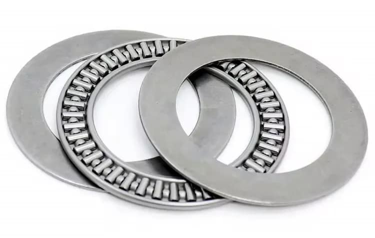 High-precision AXK series thrust needle roller bearing assembly with two AS model thrust washers, highlighting the compact, low-profile design for high axial load applications.