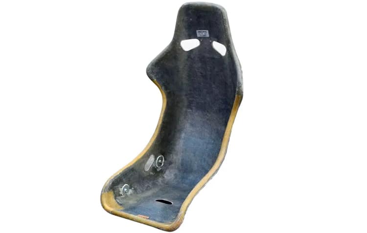 Custom-fabricated fiberglass racing seat shell using precision hand lay-up process, featuring a high-strength composite structure and ergonomic design for professional motorsports and sim racing, supplied by DISLAB.