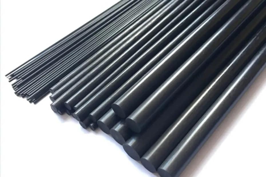 High-strength solid pultruded carbon fiber rods in various diameters for structural reinforcement and drone components.