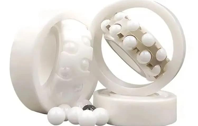 A pair of precision white GCr15 steel double row self-aligning ball bearings (DB configuration), featuring specialized cages and scattered premium ceramic balls, engineered for automatic misalignment compensation up to 3 degrees in complex industrial drive systems, provided by DISLAB.