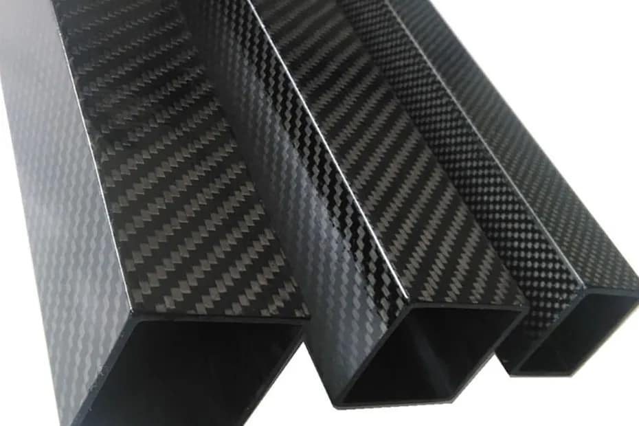 Close-up showing a comparison of three custom carbon fiber square tubes with high-quality 3K twill weave pattern, illustrating matte and glossy surface finish options for industrial applications.