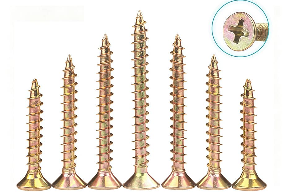 Yellow zinc plated cross drive chipboard screws, showing different lengths and flat countersunk head for furniture assembly, DIN7505 standard.